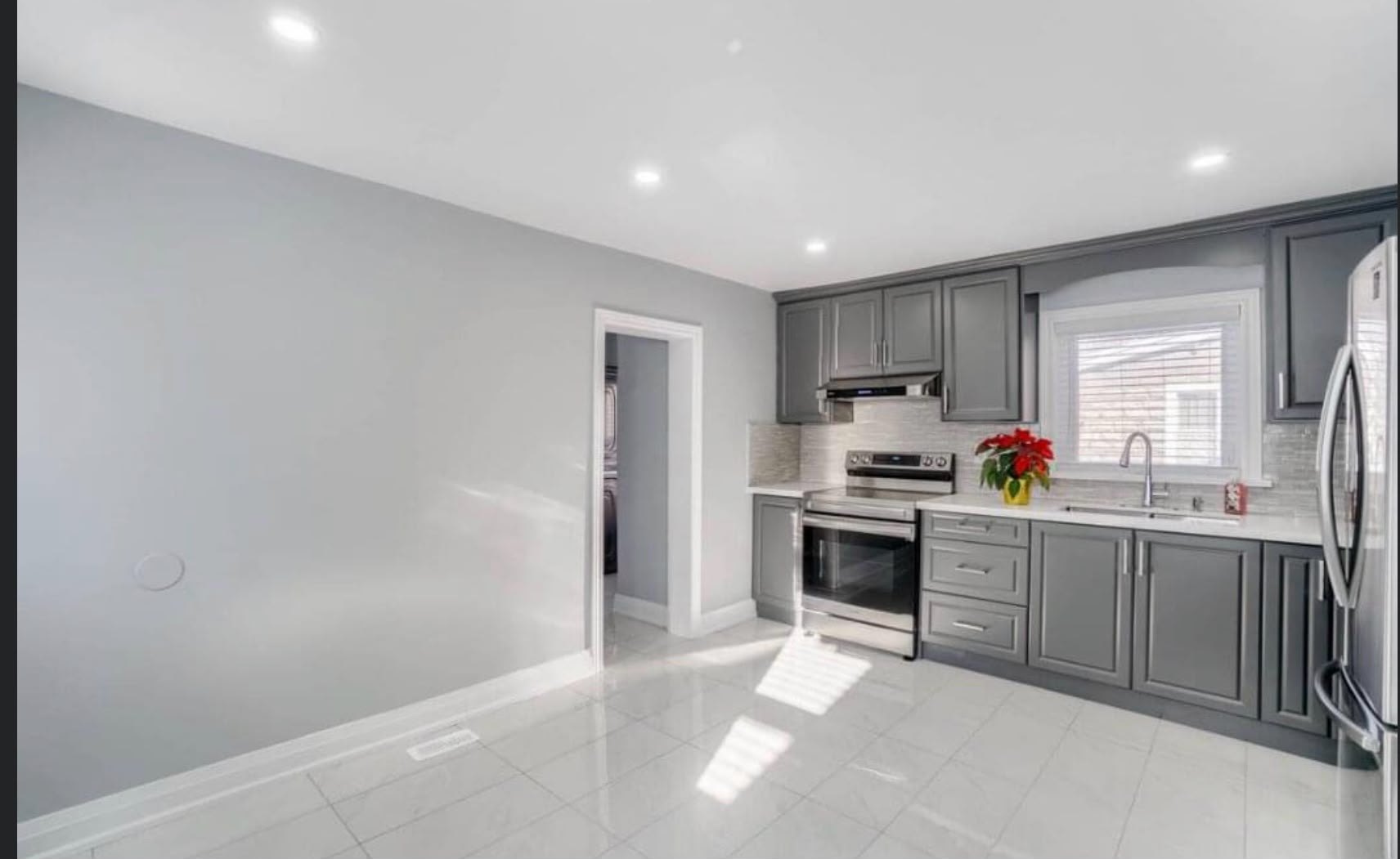 Wide View of Finished Basement by Reliance Contracting 168
