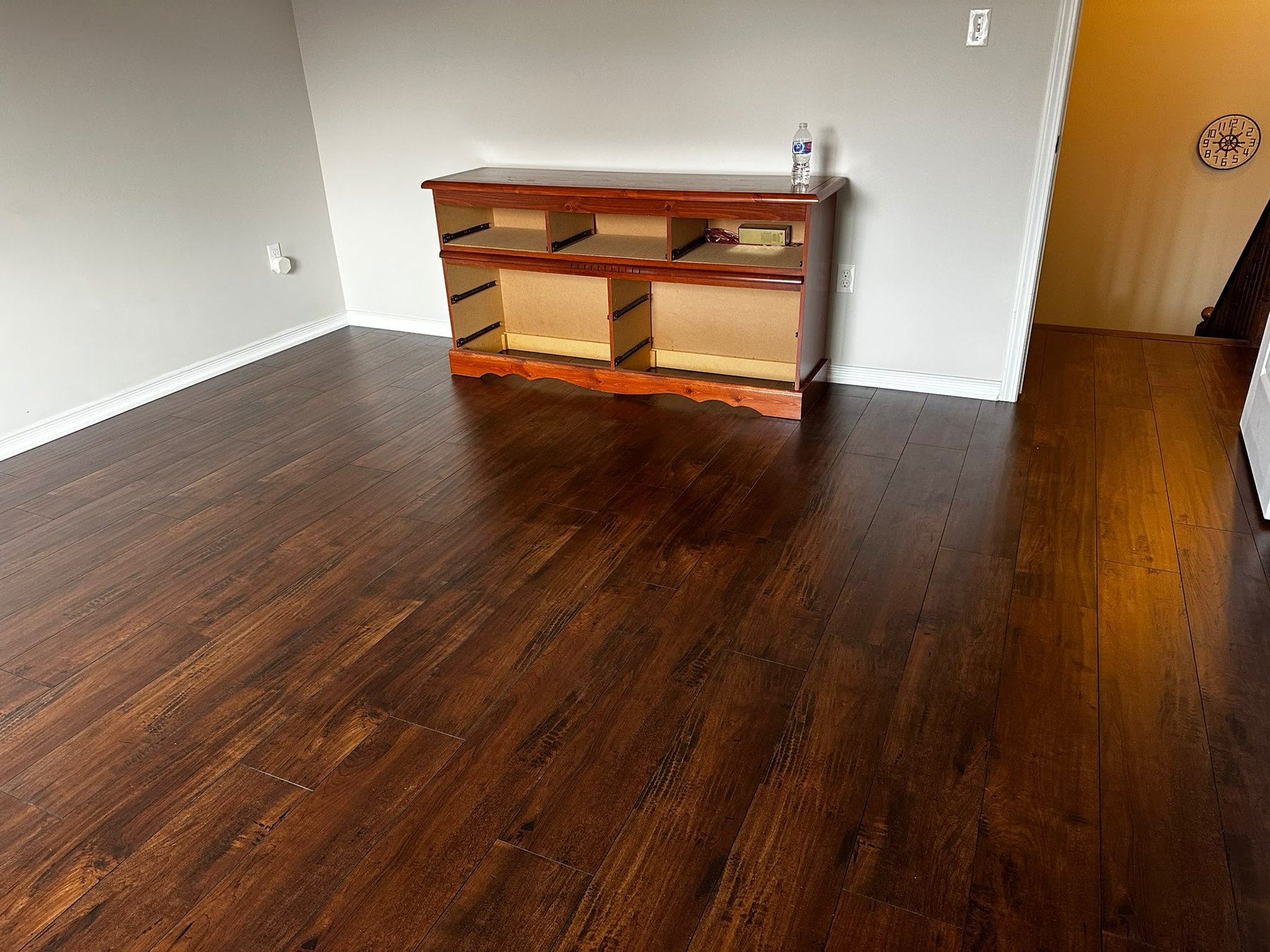 Dark Hardwood Basement Floor by Reliance Contracting 168