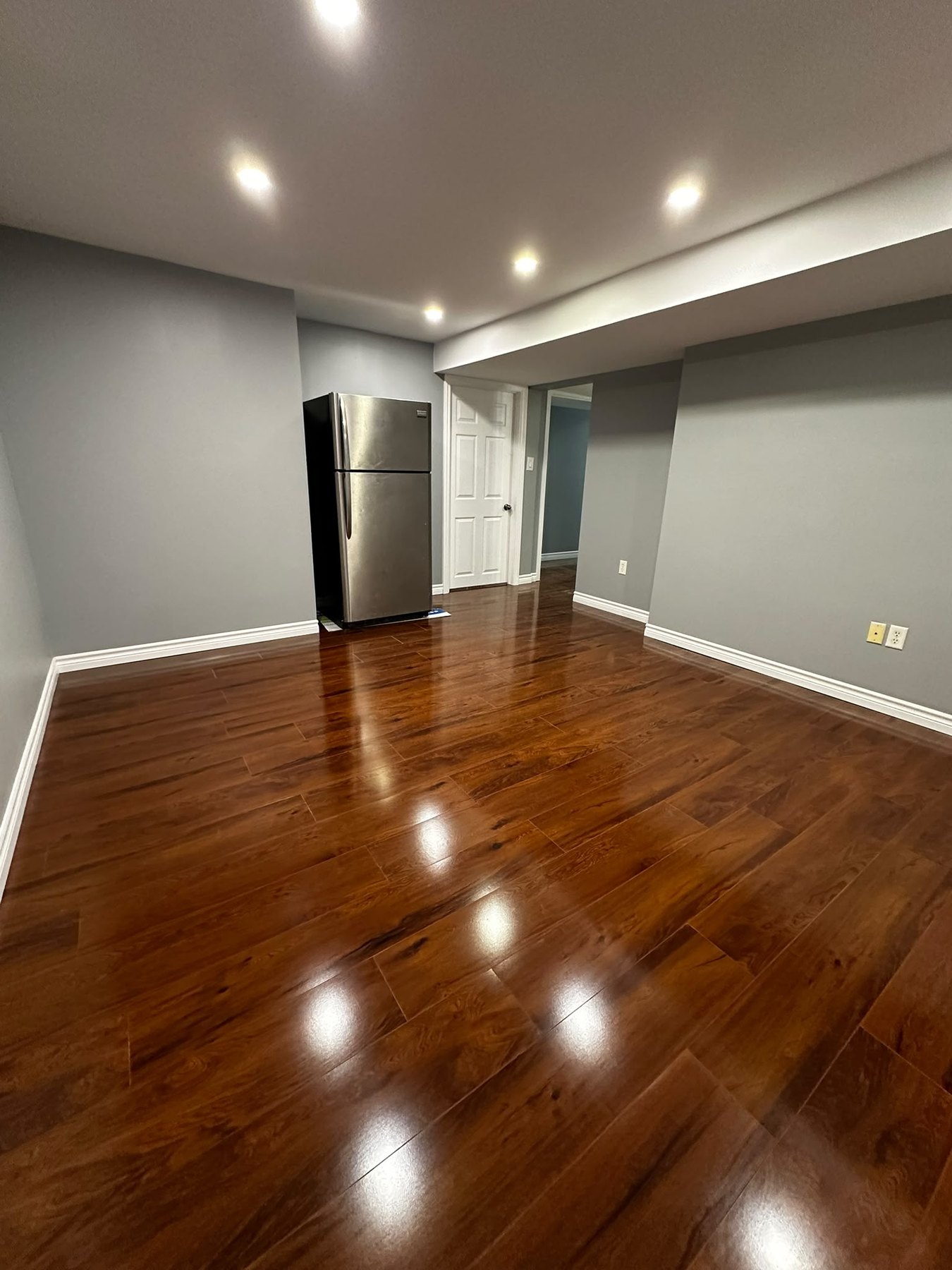 Dark Hardwood Living Area by Reliance Contracting 168