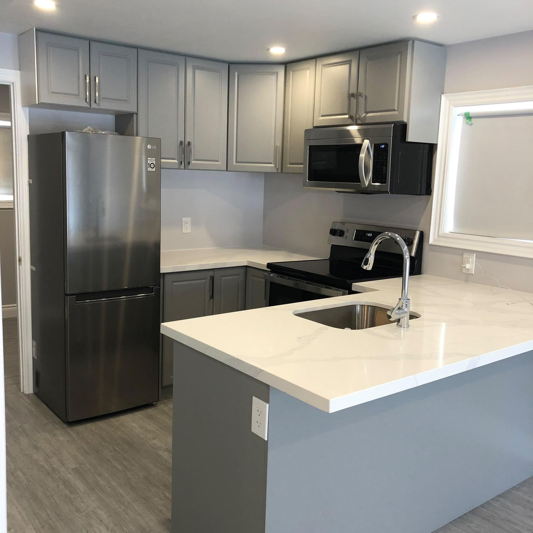 Grey Peninsula Kitchen by Reliance Contracting 168